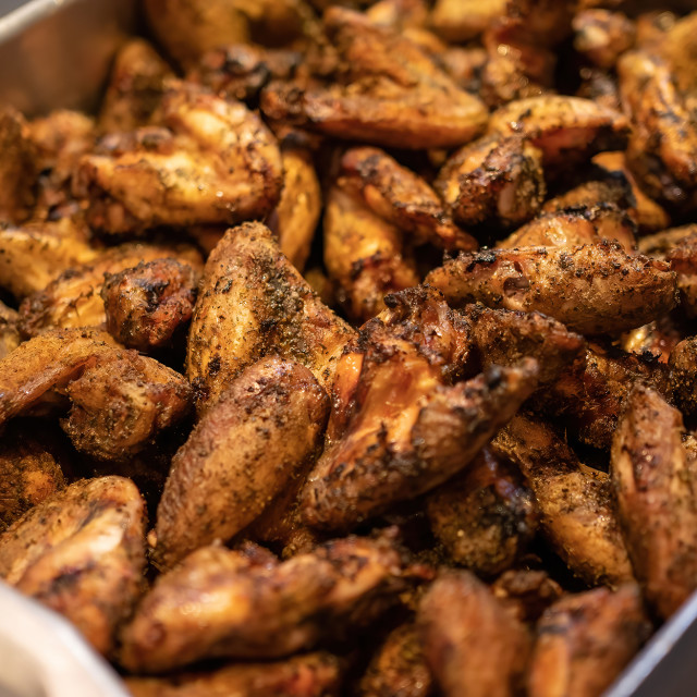 "Slow Smoked Chicken WIngs" by Pete Griffiths - £10.00 "Slow Smoked Chicken WIngs" stock image