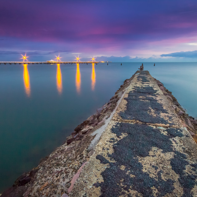 "Long exposure shot of a pier at sunrise" by Matt Sheumack - $12.46 "Long exposure shot of a pier at sunrise" stock image
