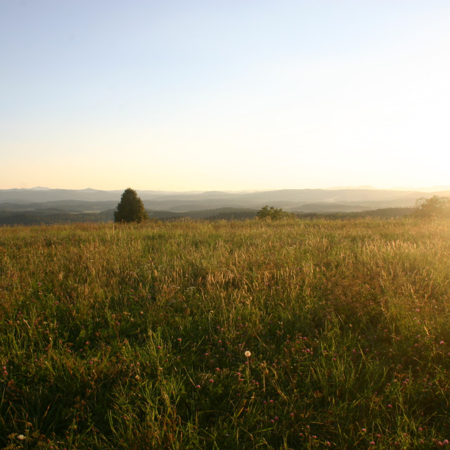 "Sunset overlooking a field" by Nature2Cool Photography - $12.20 "Sunset overlooking a field" stock image