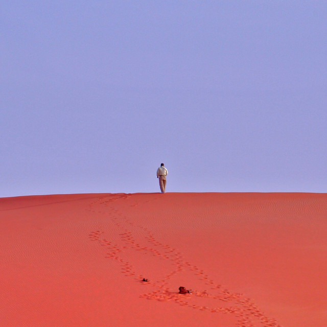 "Walking Alone" by Sadiq A Al Qatari - £10.00 "Walking Alone" stock image
