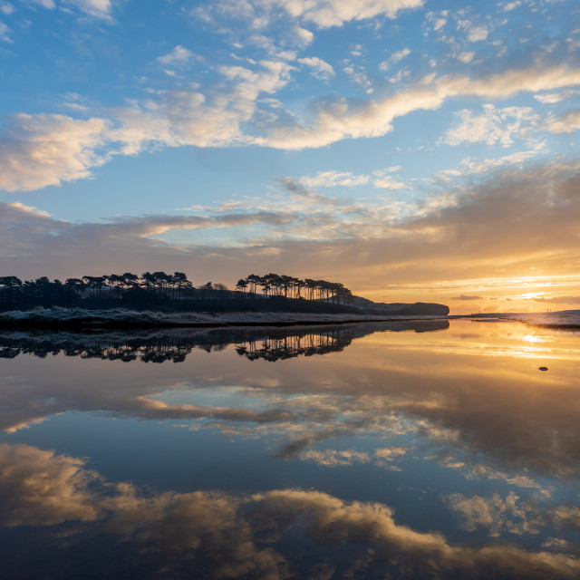 "New Years Sunrise at Budleigh Salterton" by Bruce Little - £20.00 "New Years Sunrise at Budleigh Salterton" stock image