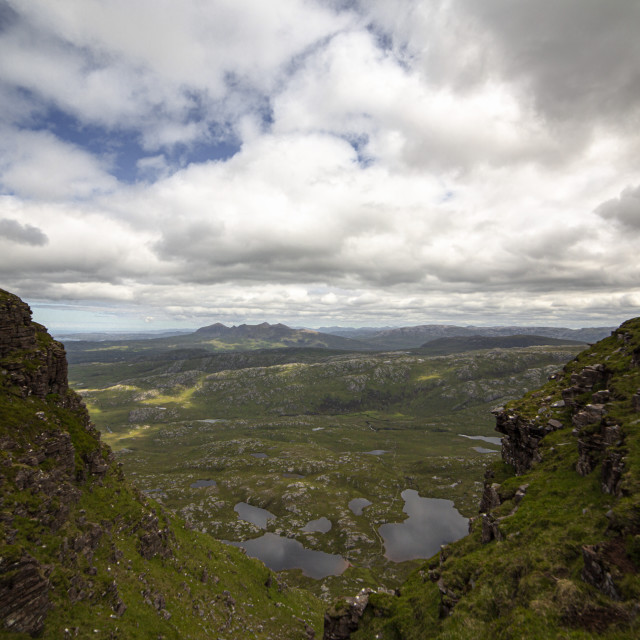 "Between Two Peaks. Reaching the Summit of Suilven." by John McGowan - £10.00 "Between Two Peaks. Reaching the Summit of Suilven." stock image