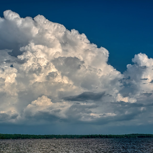 "Cumulous cloud floating over Georgian Bay" stock image