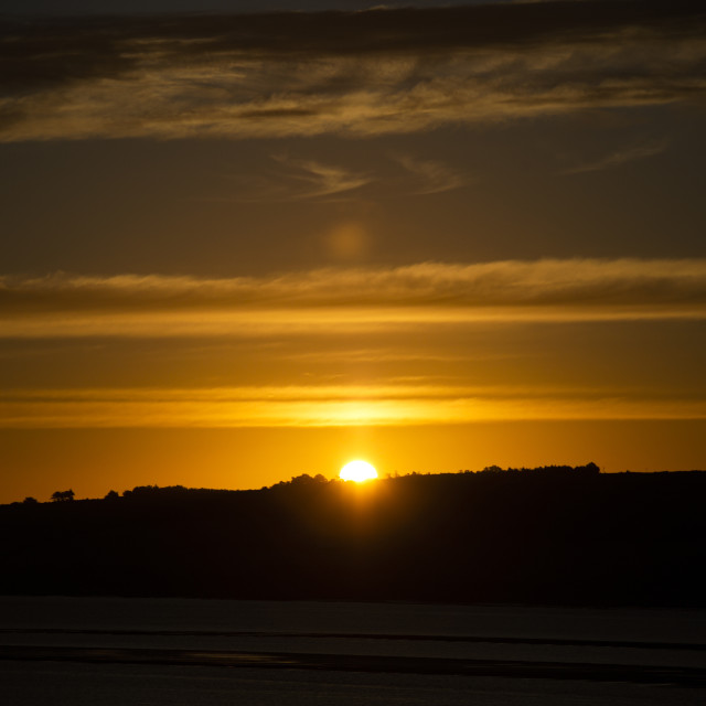 "Sunrise from Ardullie, Scottish Highlands" by John McGowan - £10.00 "Sunrise from Ardullie, Scottish Highlands" stock image