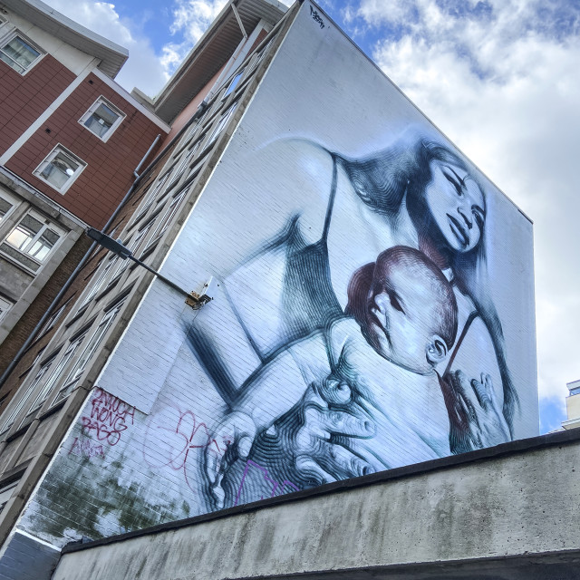 "Mother and child street art" stock image