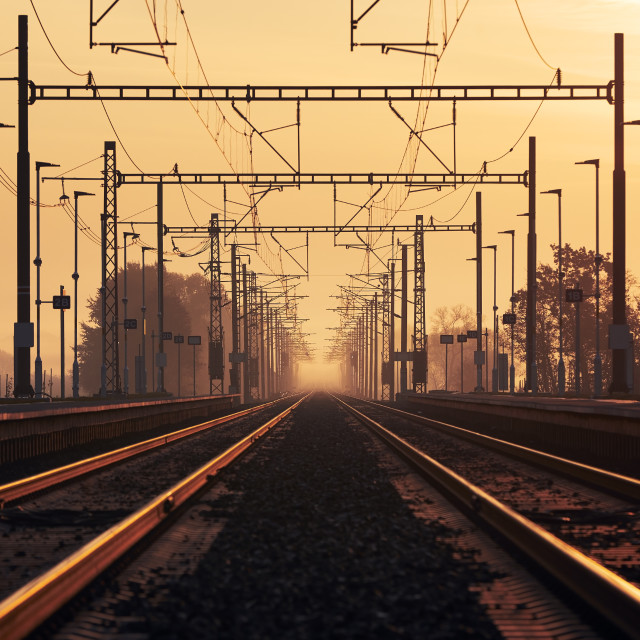 "Railway at golden sunrise" stock image