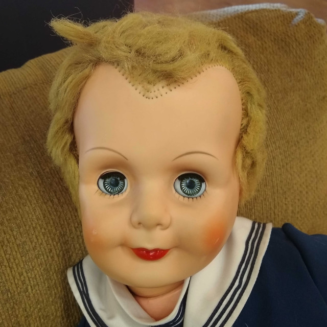 "Pretty Blue Eyes Antique Vintage Doll" stock image