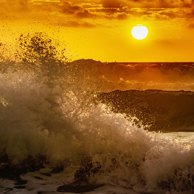 "Intense waves at sunrise" by Expvisual Filmmaking and Photography SAS de CV - $12.55 "Intense waves at sunrise" stock image
