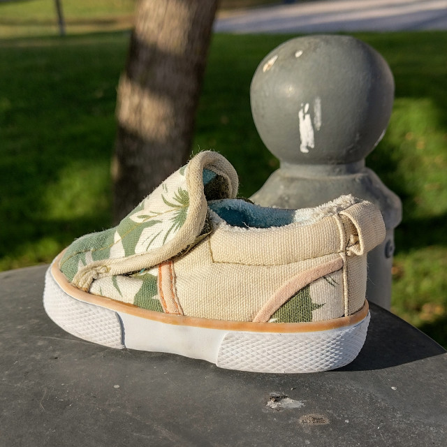 "Small Shoe Left Behind" by Paul Wilcox - $9.29 "Small Shoe Left Behind" stock image