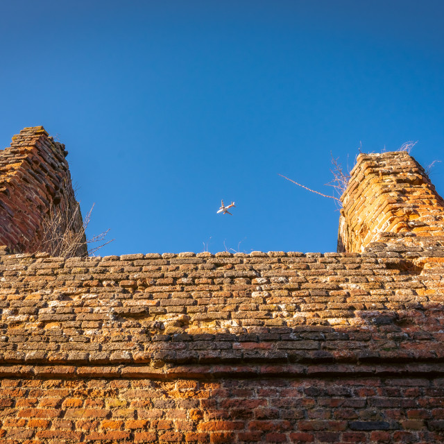 "Someries Castle Plane Passing Over" stock image