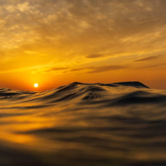 "Sunset and waves" stock image