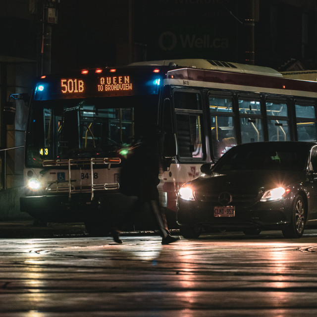 "Man Crossing Road Queen and Spadina" stock image