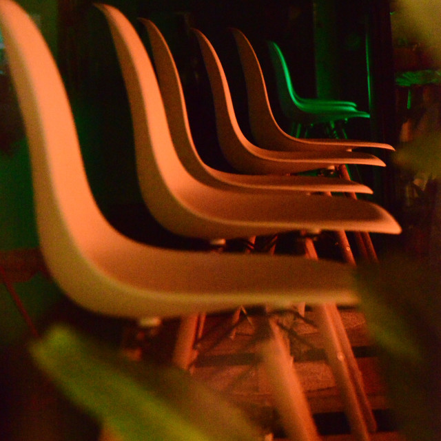"chairs in a line" by Amit Mendelsohn - $48.98 "chairs in a line" stock image