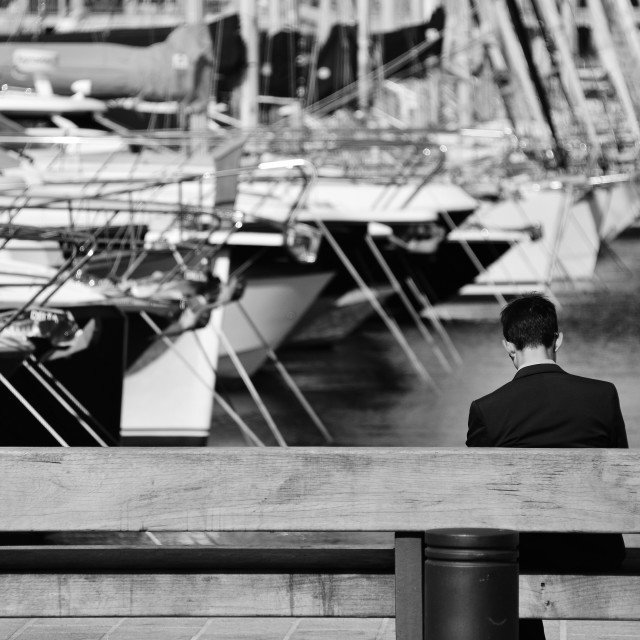 "Alone on the bench" by Amit Mendelsohn - £50.00 "Alone on the bench" stock image
