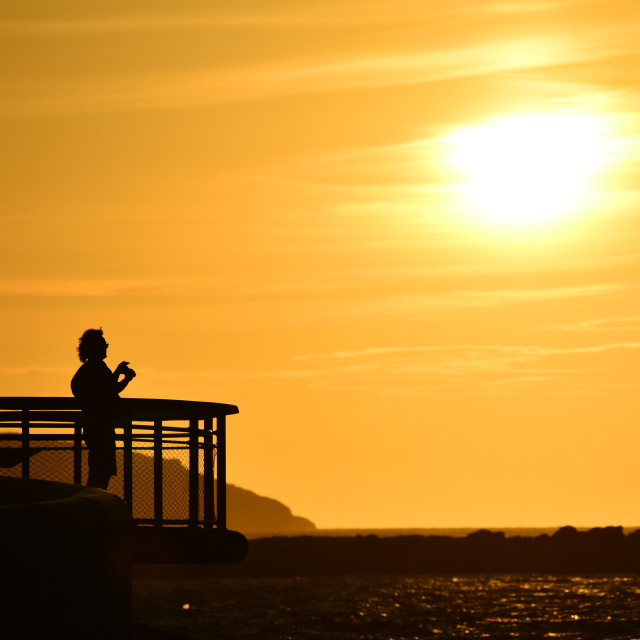 "Shooting in the sunset" by Amit Mendelsohn - £50.00 "Shooting in the sunset" stock image