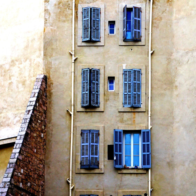 "Facade with blue windows" by Amit Mendelsohn - £50.00 "Facade with blue windows" stock image