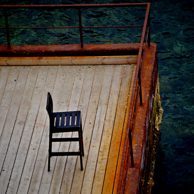 "A lonely chair" by Amit Mendelsohn - £50.00 "A lonely chair" stock image