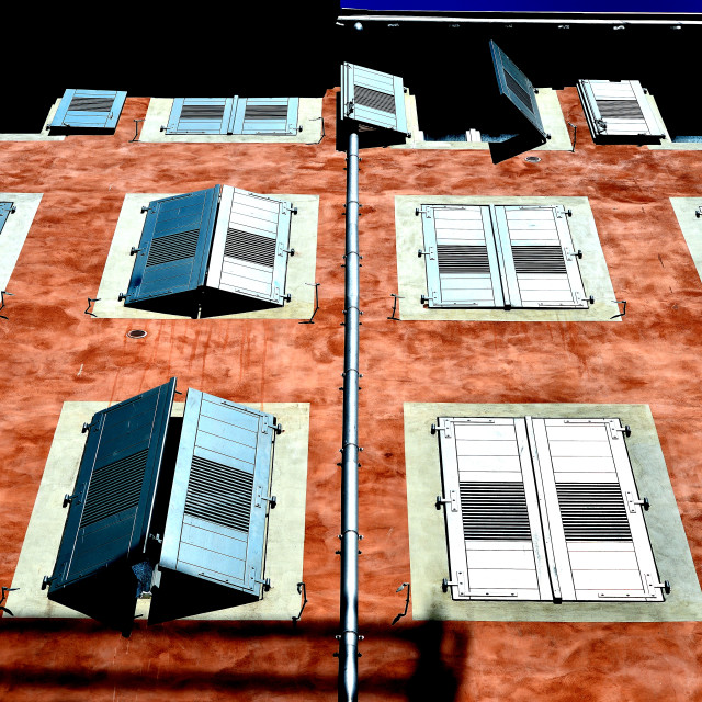 "Red facade with windows" by Amit Mendelsohn - £50.00 "Red facade with windows" stock image
