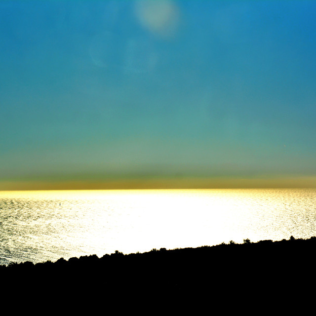 "Sunset and the horizon" by Amit Mendelsohn - $48.91 "Sunset and the horizon" stock image