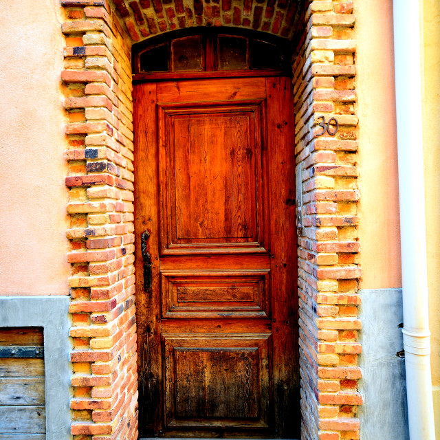 "A door framed with bricks" by Amit Mendelsohn - $48.91 "A door framed with bricks" stock image