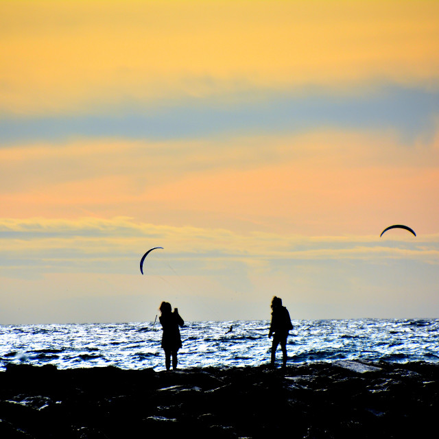 "2 persons in the sunset" by Amit Mendelsohn - $48.91 "2 persons in the sunset" stock image