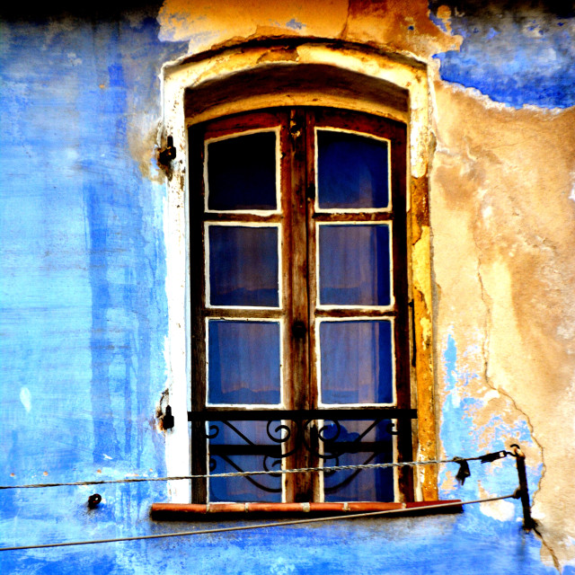 "A window on a blue wall" by Amit Mendelsohn - $48.91 "A window on a blue wall" stock image