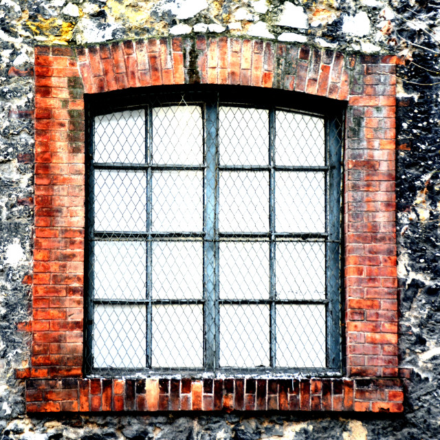 "A window framed with bricks" by Amit Mendelsohn - $48.79 "A window framed with bricks" stock image