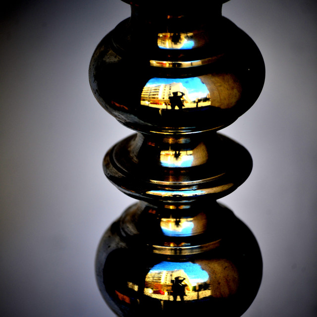 "a bright reflective designed candle holder" by Amit Mendelsohn - $48.79 "a bright reflective designed candle holder" stock image