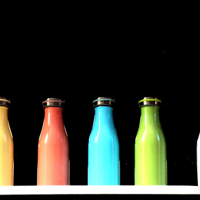 "5 coloured bottles" stock image