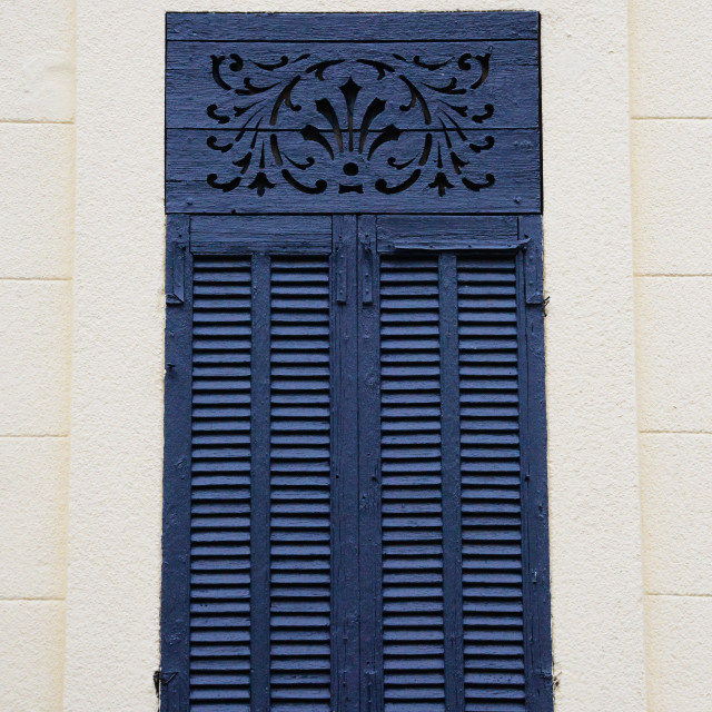 "Blue window with carving" by Amit Mendelsohn - £50.00 "Blue window with carving" stock image