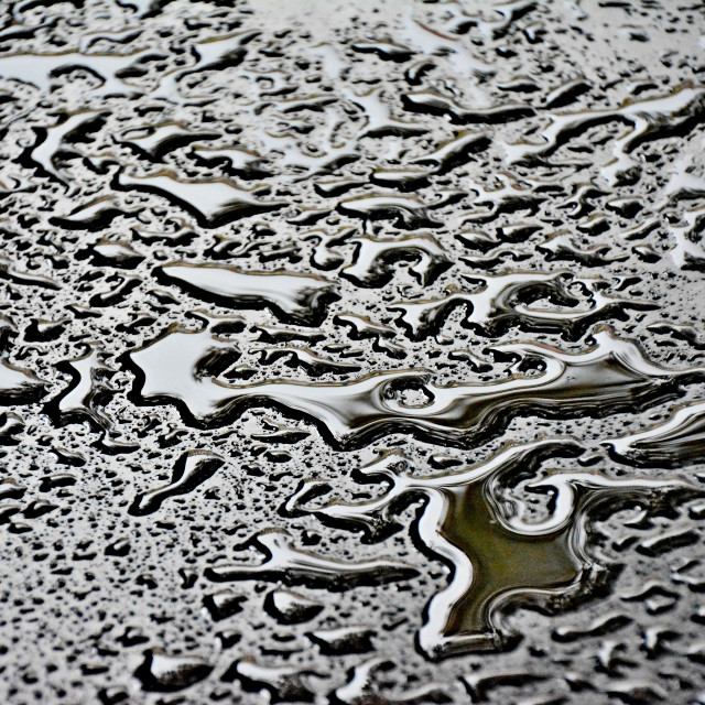 "Water on a metal surface" by Amit Mendelsohn - $49.42 "Water on a metal surface" stock image