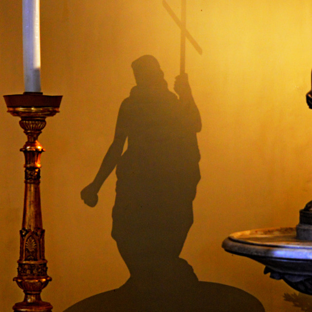 "Shadow holding the cross" by Amit Mendelsohn - £50.00 "Shadow holding the cross" stock image