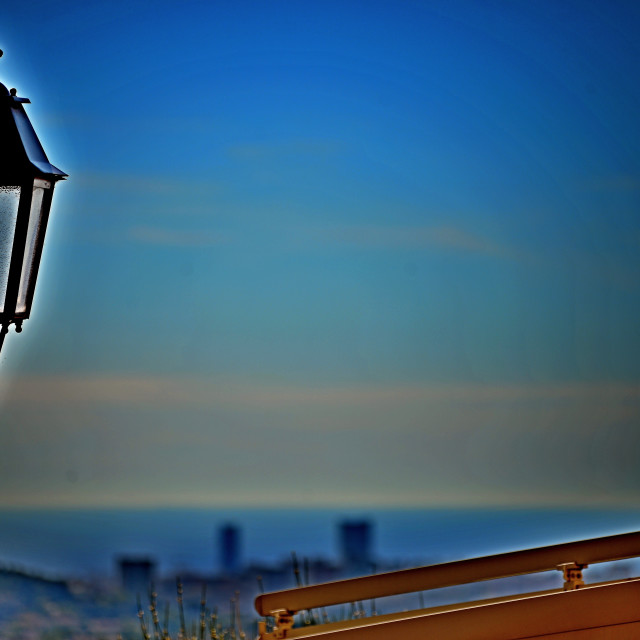 "A lamp and the city in the background" by Amit Mendelsohn - £50.00 "A lamp and the city in the background" stock image