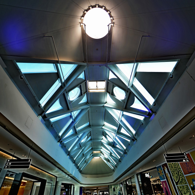 "A corridor in a shopping center" by Amit Mendelsohn - £50.00 "A corridor in a shopping center" stock image