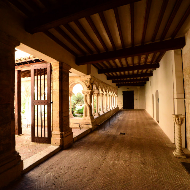 "The exit to the yard in Aix Cathedral" by Amit Mendelsohn - £50.00 "The exit to the yard in Aix Cathedral" stock image
