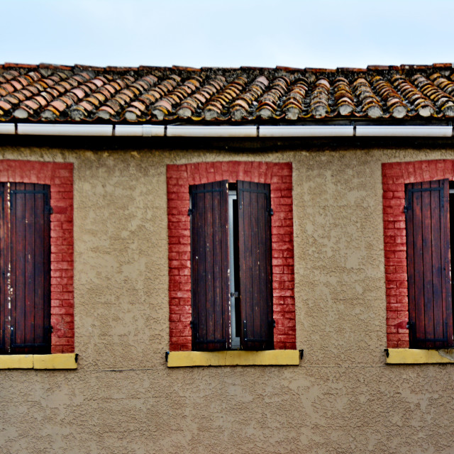 "3 windows framed with bricks" by Amit Mendelsohn - £50.00 "3 windows framed with bricks" stock image