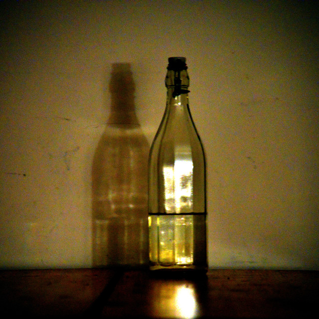 "A bottle and reflection" by Amit Mendelsohn - £50.00 "A bottle and reflection" stock image