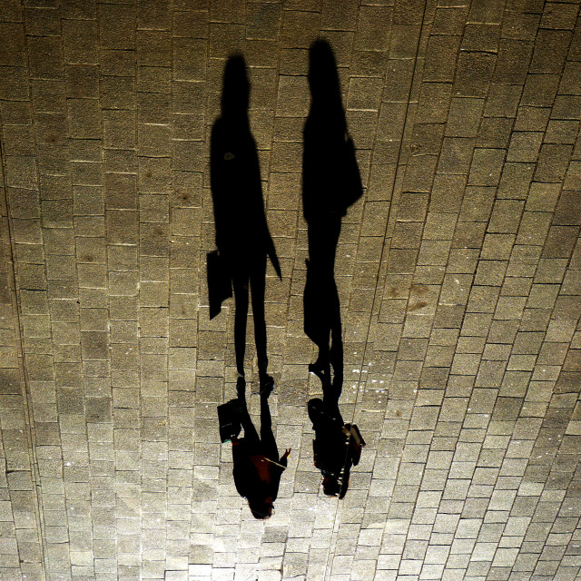 "2 people 2 shadows" stock image