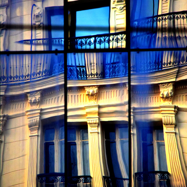 "reflection over a glass building" by Amit Mendelsohn - £50.00 "reflection over a glass building" stock image