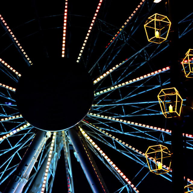 "The wheel and Christmas lights" by Amit Mendelsohn - £50.00 "The wheel and Christmas lights" stock image