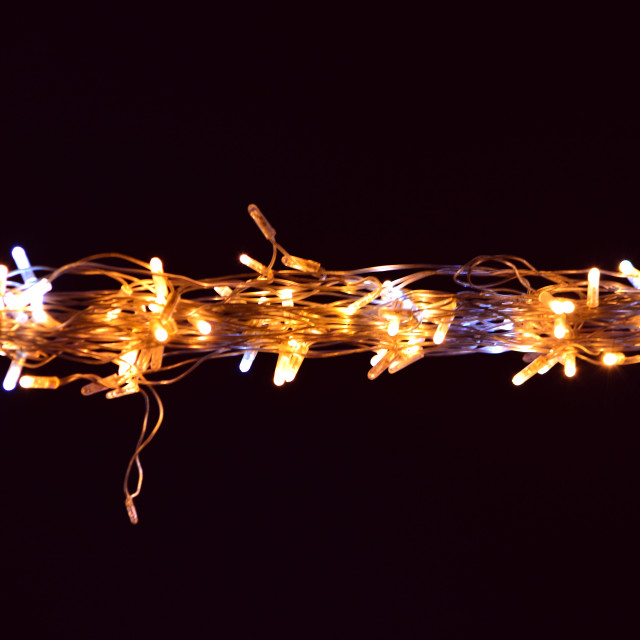 "Light on a wire" by Amit Mendelsohn - £50.00 "Light on a wire" stock image