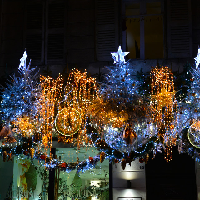 "Christmas lights above a shop" by Amit Mendelsohn - £50.00 "Christmas lights above a shop" stock image
