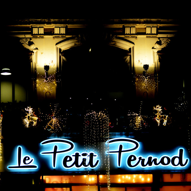"Christmas light above a café" by Amit Mendelsohn - £50.00 "Christmas light above a café" stock image
