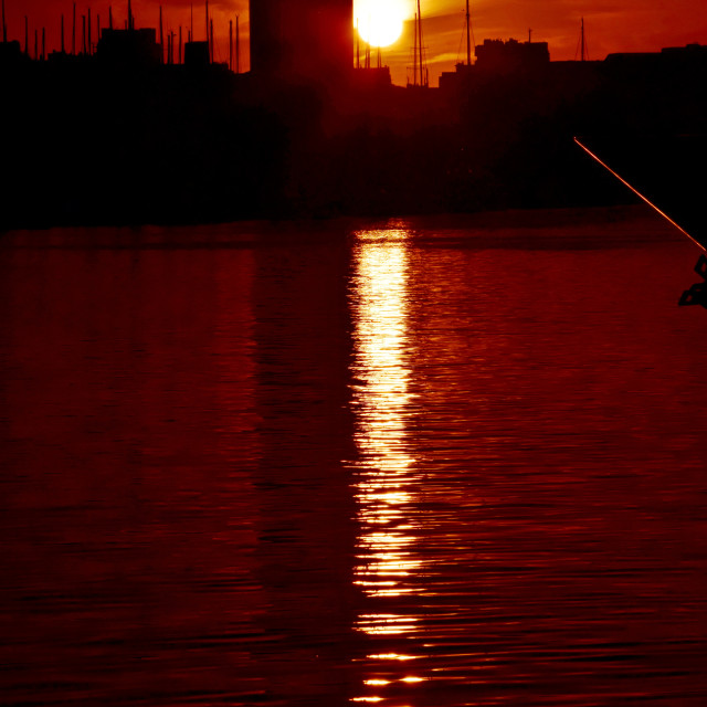 "Red sunset on the port" by Amit Mendelsohn - £50.00 "Red sunset on the port" stock image