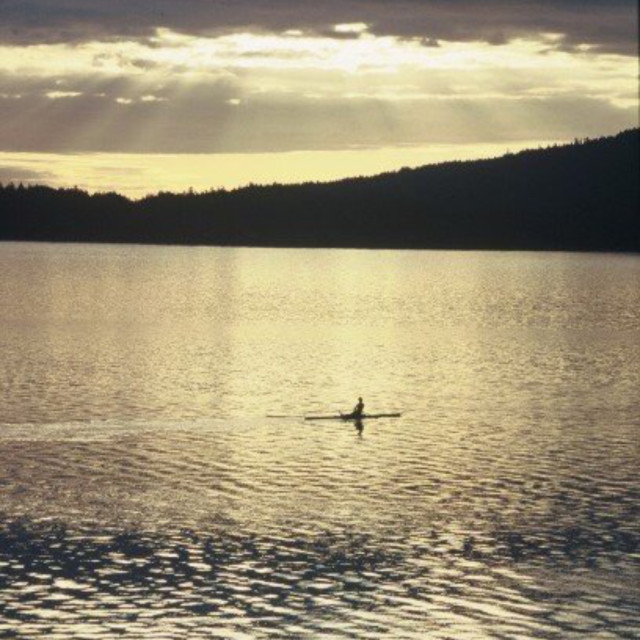 "Lone Sculler on Strait of Georgia" stock image