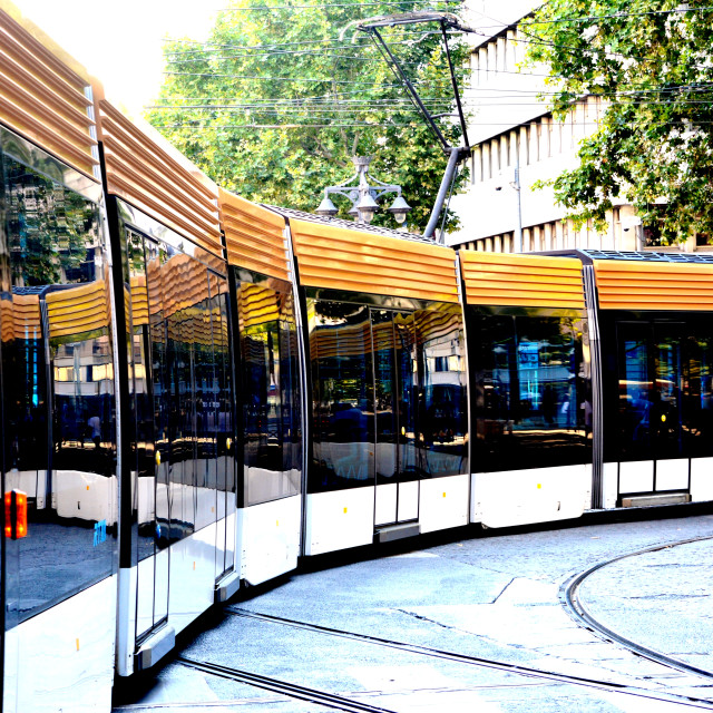 "The tram reflection is on the same tram" by Amit Mendelsohn - £50.00 "The tram reflection is on the same tram" stock image