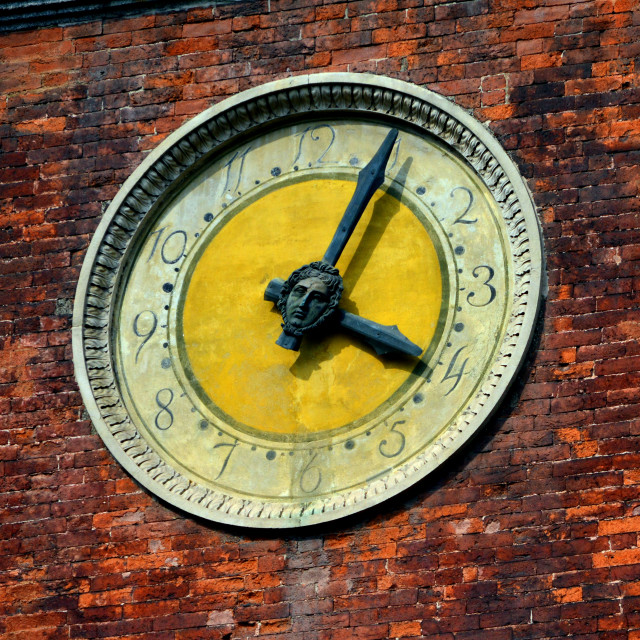 "A clock on a wall in Milano" by Amit Mendelsohn - £50.00 "A clock on a wall in Milano" stock image