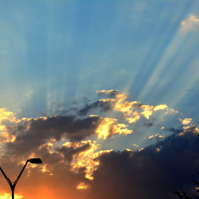 "Sunset with rays up" stock image