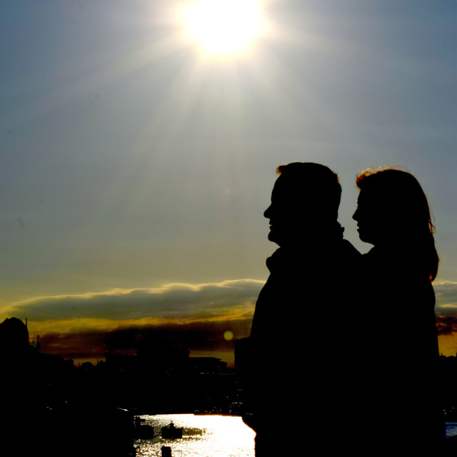 "A couple in the sunset" by Amit Mendelsohn - £50.00 "A couple in the sunset" stock image