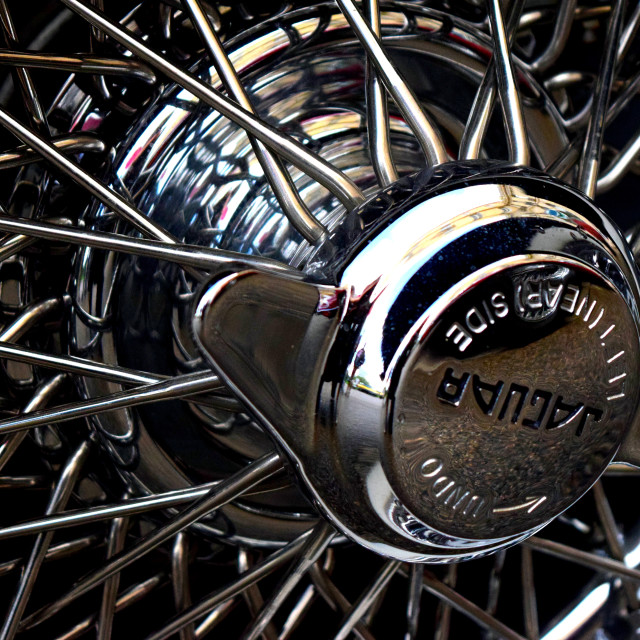 "An old wheel of a jaguar" stock image